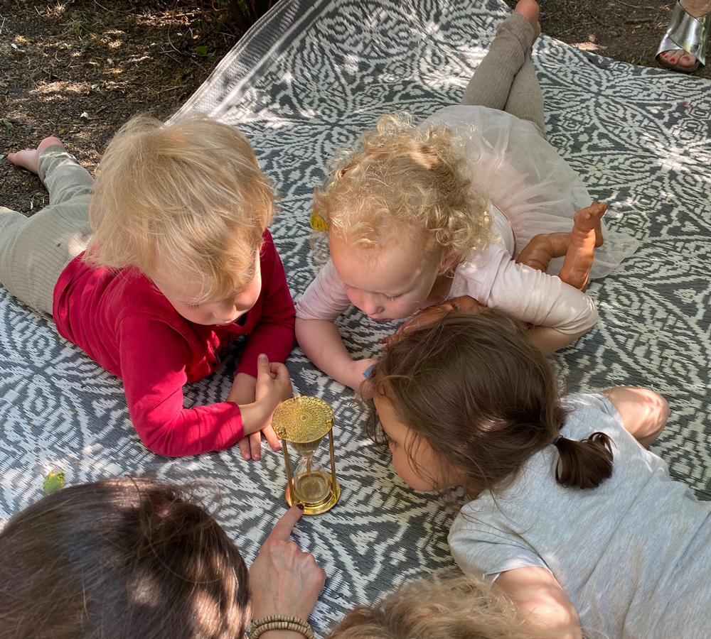 kids lying on a blanket